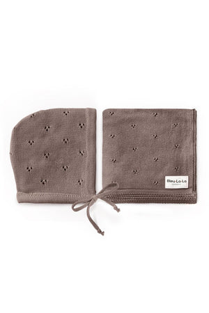 Brown organic cotton pointelle swaddle blanket and hat set by Bleu-La-La, featuring a delicate knit pattern.