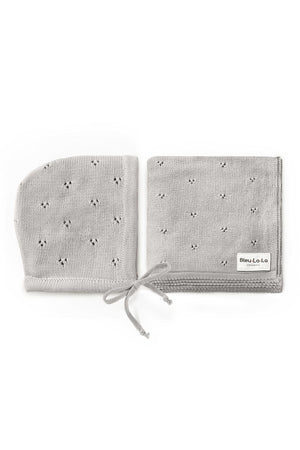 Gray organic cotton pointelle swaddle blanket and hat set with delicate patterns, labeled Bleu La-La Organics.