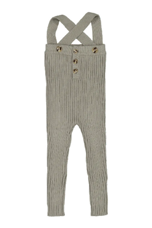 Sage knit cotton overall featuring adjustable crisscross straps and button details, accompanied by a wooden mushroom toy. Ideal for babies and toddlers, combining style with comfort in eco-friendly materials.