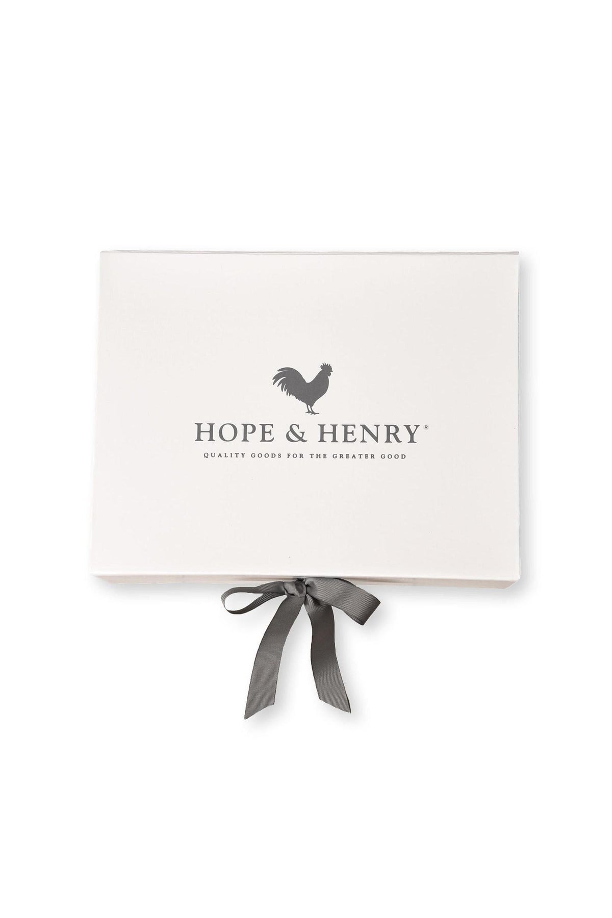 A neatly tied gray ribbon adorns a white gift box featuring the Hope & Henry logo, which reads Quality Goods for the Greater Good. The box is elegant and inviting.