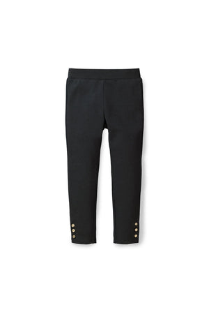 Black ponte pants for toddlers and girls, featuring a comfortable waistband and decorative button cuffs. Made from organic cotton, these stylish pants are perfect for everyday wear.
