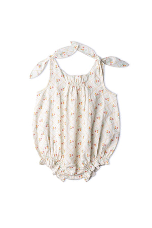 Lightly patterned in soft pastel colors, this organic cotton tie shoulder bubble romper features adjustable straps and a relaxed silhouette, perfect for comfortable play. Ideal for everyday wear.
