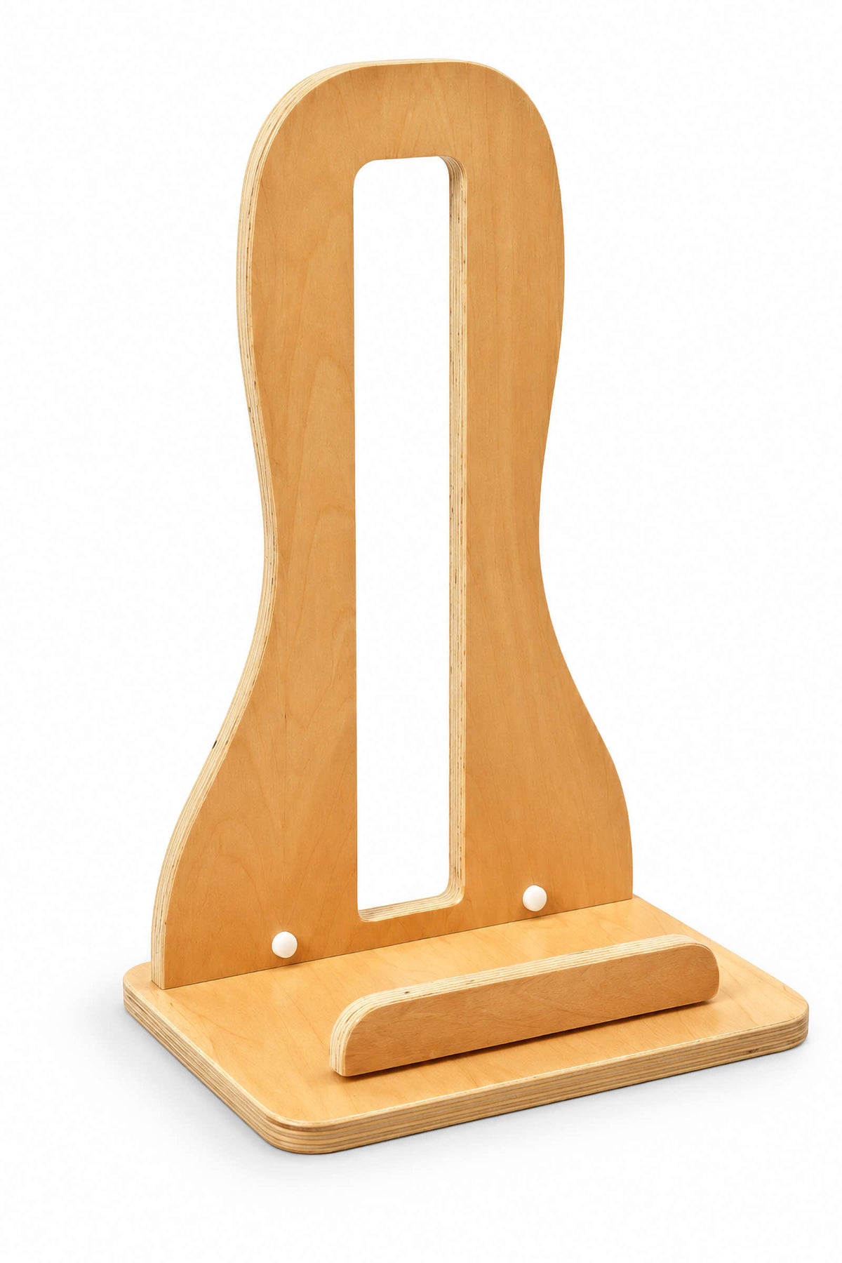 A sturdy wooden bike stand with a smooth, natural finish, designed to keep balance bikes upright and organized. Its eco-friendly construction offers durability and protection for childrens bikes.