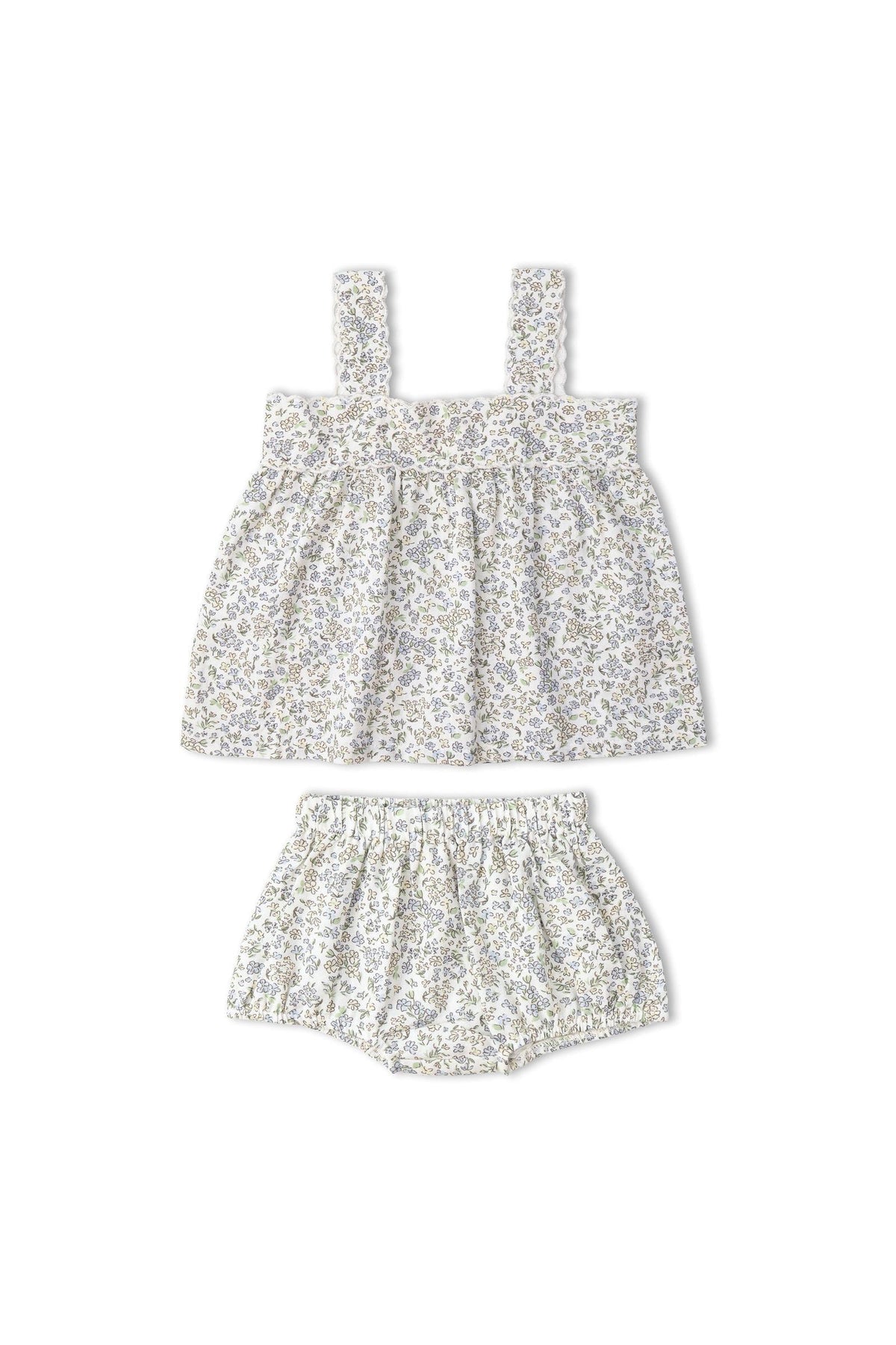 A floral-patterned, sleeveless top with a gathered waist is paired with matching bloomers. The set features soft, breathable fabric, ideal for warm weather, and is suitable for young children.