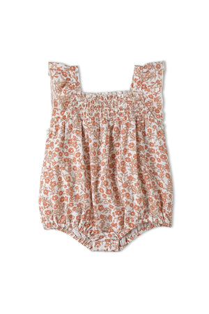 Lightweight organic cotton bubble romper in a floral pattern features ruffled sleeves and a smocked bodice. Ideal for warm weather play, this eco-friendly outfit is perfect for little ones.