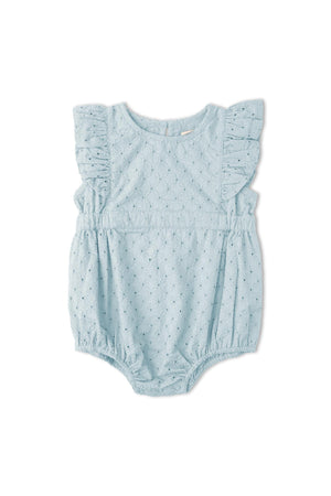 Light blue organic cotton romper featuring delicate eyelet embroidery and flutter sleeves. Perfect for warm-weather outings, this stylish piece is designed for comfort and playful elegance.