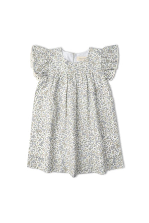 A light blue organic cotton dress featuring flutter sleeves and a delicate floral print. This charming piece is perfect for young girls, combining comfort and style for everyday wear.