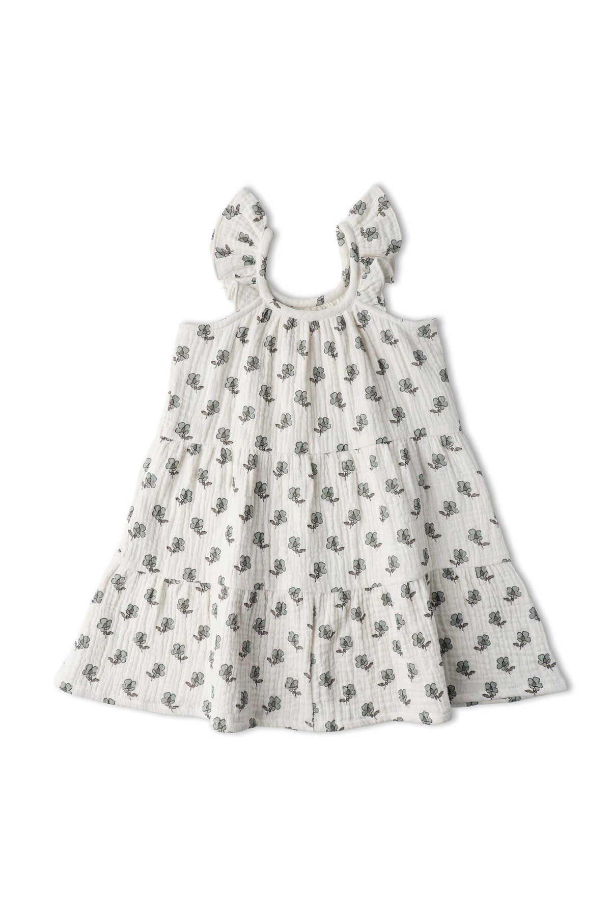 A light-colored, organic cotton dress featuring a tiered design with delicate floral patterns and ruffle straps. This playful dress is perfect for warm days and twirling adventures.