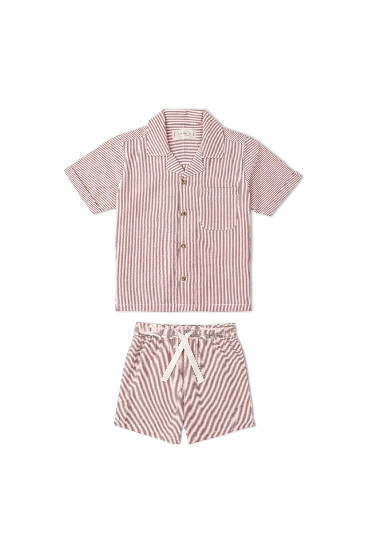 A coral-striped shirt and shorts set for children, made from lightweight organic cotton. The short-sleeved shirt features a pocket, while the shorts have a comfortable drawstring waist.