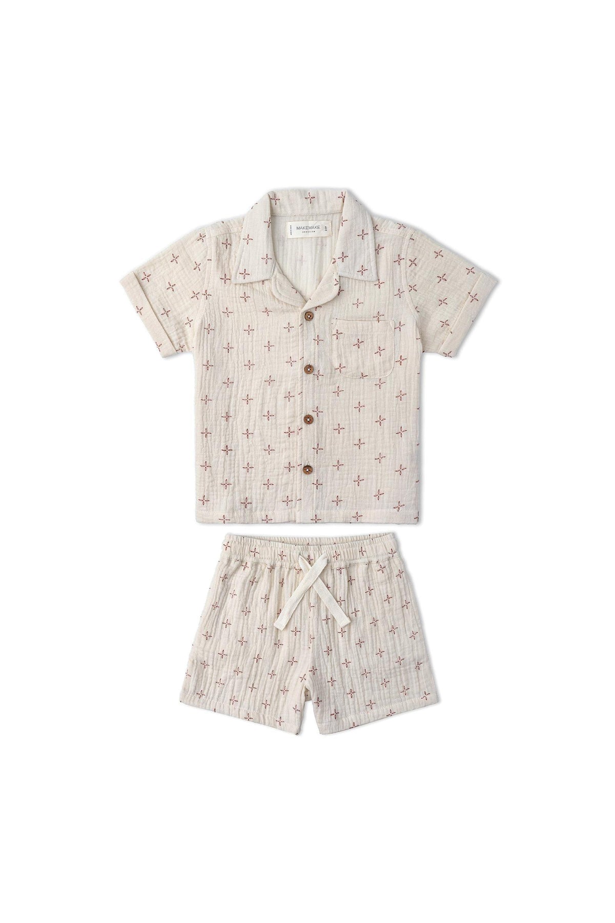 Lightweight organic cotton shirt and shorts set featuring a cream base with subtle red cross patterns. Perfect for keeping kids cool and comfortable during summer adventures.