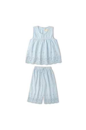 Light blue organic cotton eyelet top and pant set featuring delicate embroidered details. This breezy outfit is perfect for warm-weather outings and celebrations, ensuring comfort and style for little ones.