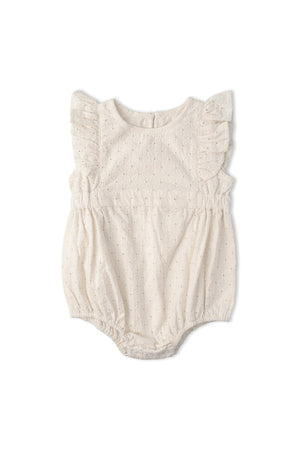 Ivory organic cotton romper featuring delicate eyelet embroidery and flutter sleeves. This breezy outfit is perfect for warm-weather outings, offering comfort and style for young children.
