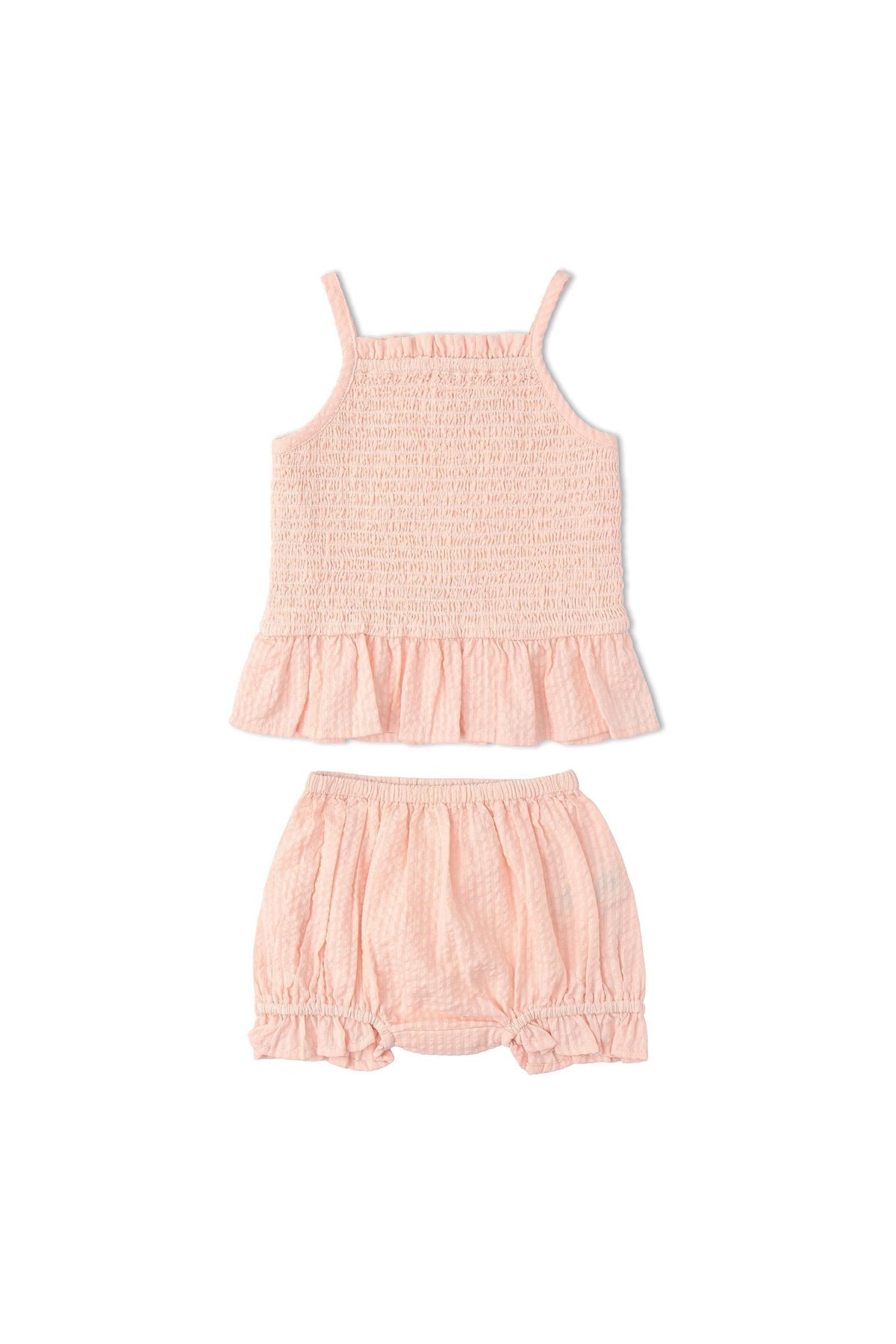 A blush organic cotton smocked top with adjustable straps is paired with matching bloomers. The light seersucker fabric offers a breezy, comfortable fit for young children.