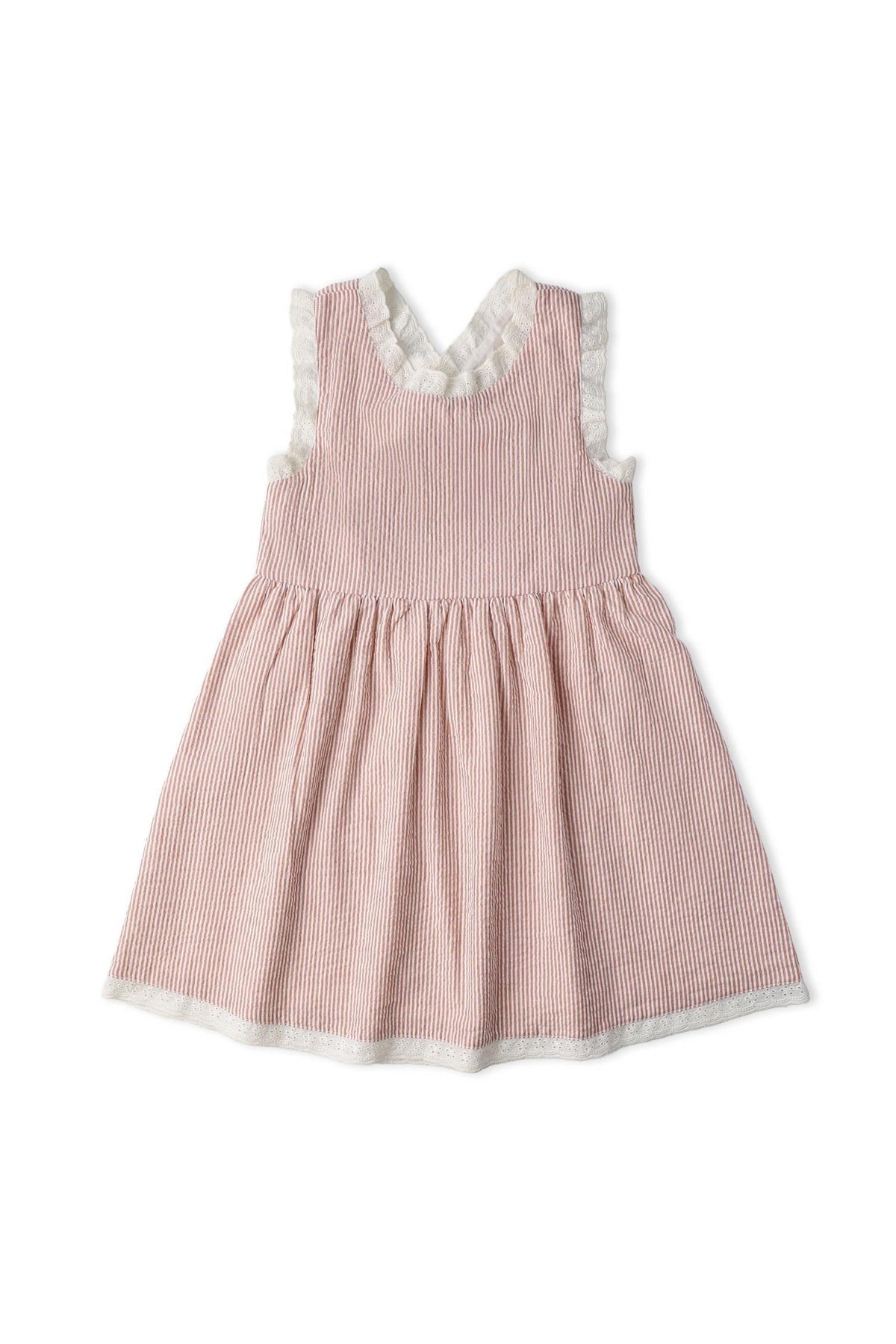 A coral-striped organic cotton dress features criss-cross straps and a gently gathered skirt. The dress is designed for comfort and style, perfect for warm-weather outings for little ones.