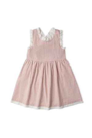 A coral-striped organic cotton dress features criss-cross straps and a gently gathered skirt. The dress is designed for comfort and style, perfect for warm-weather outings for little ones.