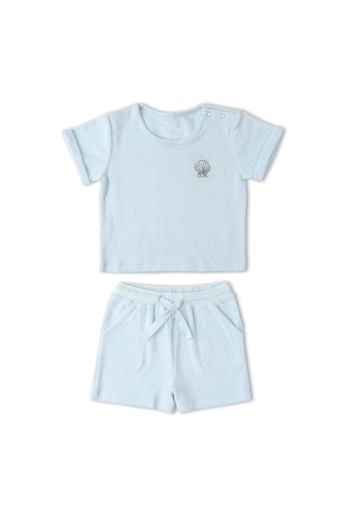 Light blue organic terry tee and shorts set featuring a soft, towel-like texture. Designed for comfort, it includes a relaxed fit, perfect for warm days and casual wear.