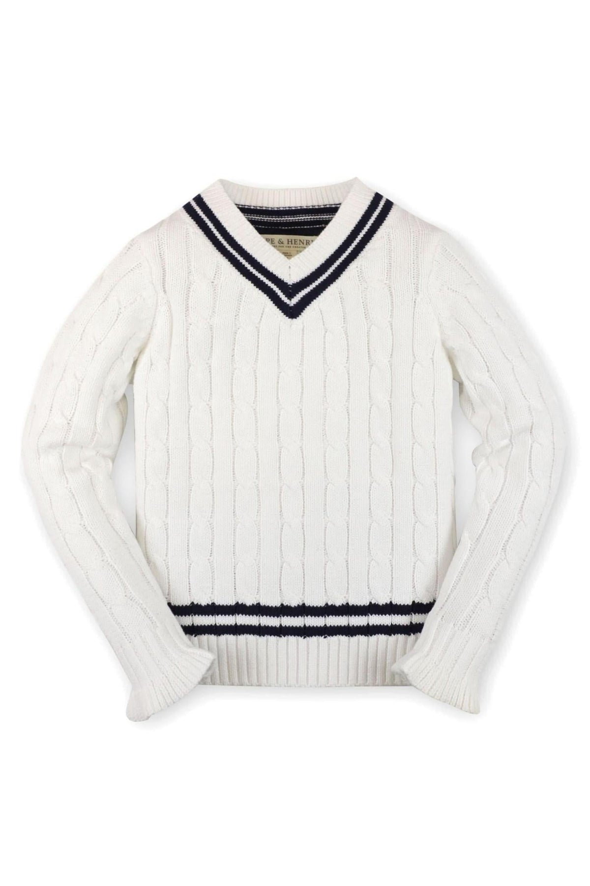 A white cable knit sweater with a v-neck, featuring navy striped detailing at the collar and hem.