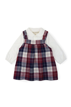 A long-sleeve white bodysuit with a Peter Pan collar is layered under a berry tartan plaid jumper.