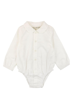 A white long-sleeve bodysuit with a Peter Pan collar and button front closure, made from organic cotton. This piece is designed for baby girls, offering both comfort and classic style.