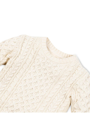 An ivory organic cotton fisherman sweater featuring a traditional cable knit pattern. The pullover style is soft and warm, suitable for children sizes 2T to 18.