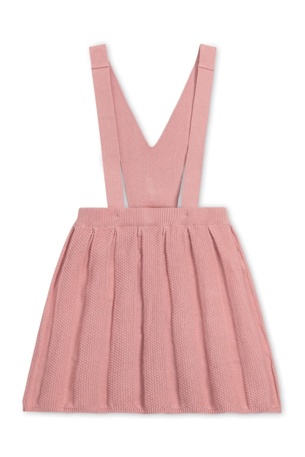 A soft rose-colored overall skirt features pleated detailing and adjustable straps, made from organic cotton for comfort.