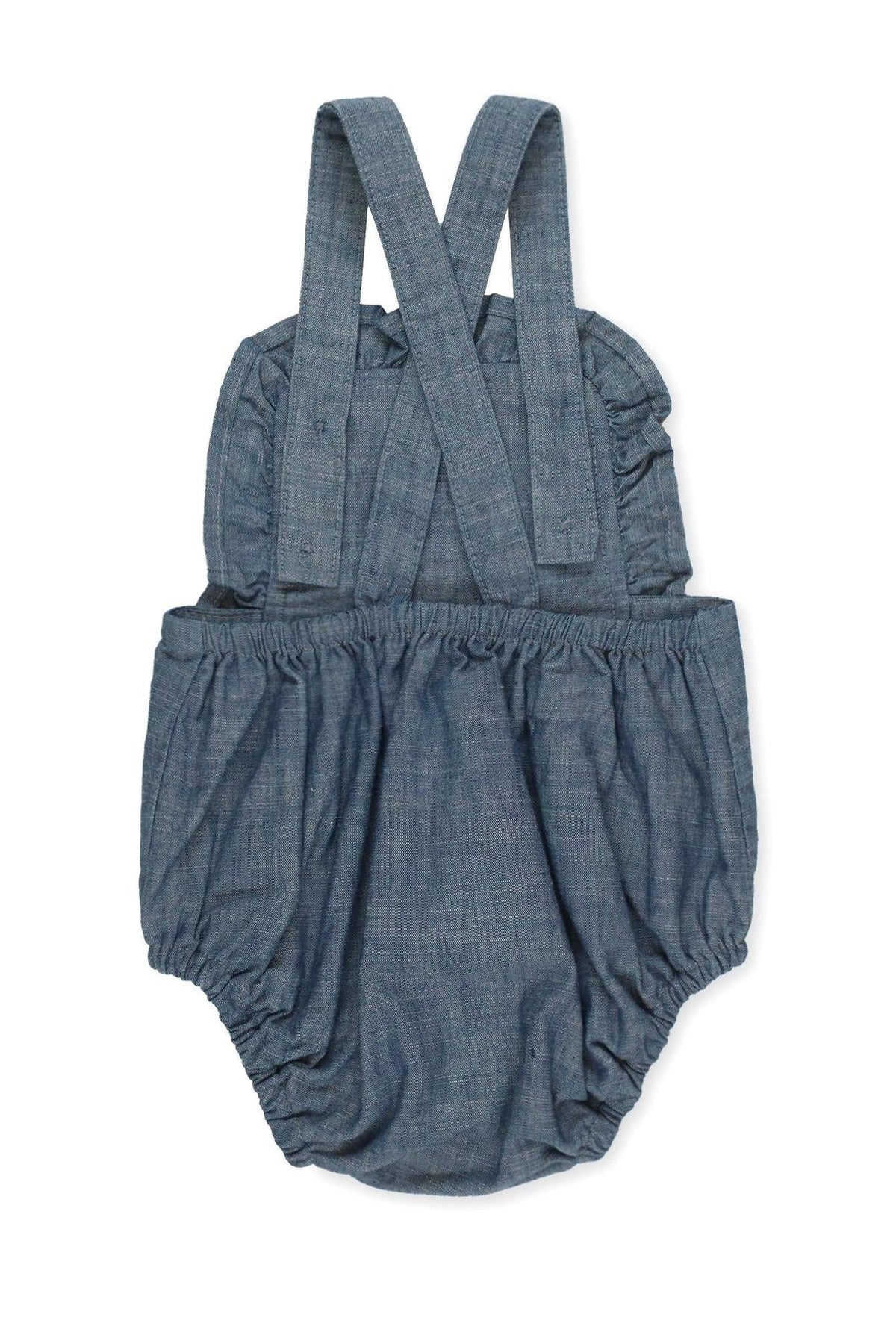 Blue chambray organic cotton ruffle sunsuit with adjustable straps and bubble silhouette, perfect for baby girls in warm weather.