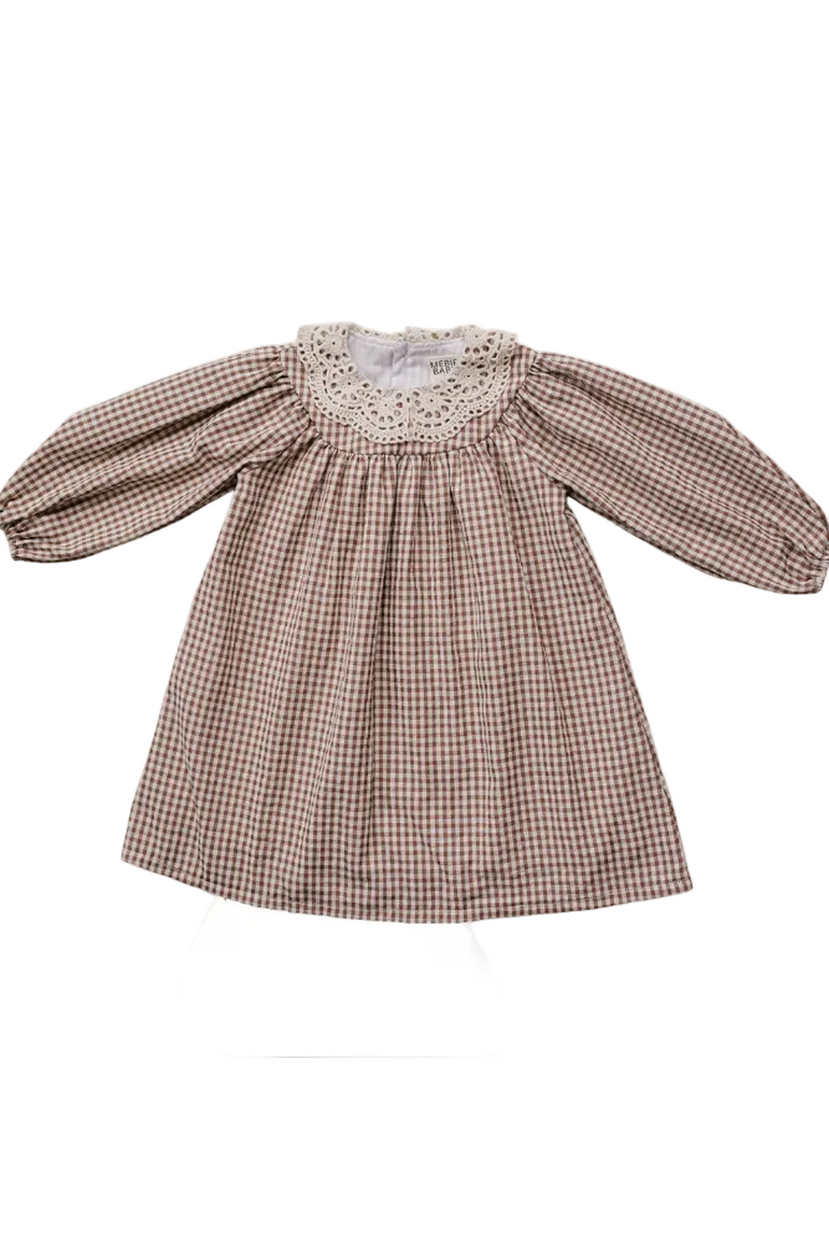 A camel gingham dress featuring a lace-trimmed collar and long puff sleeves, crafted from soft cotton. Ideal for little ones, this elegant piece is perfect for autumn wear.