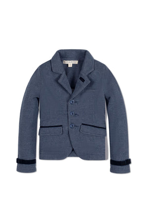 Navy blue riding blazer made from soft jacquard fleece, featuring faux suede piping and button closure. Ideal for cooler weather.