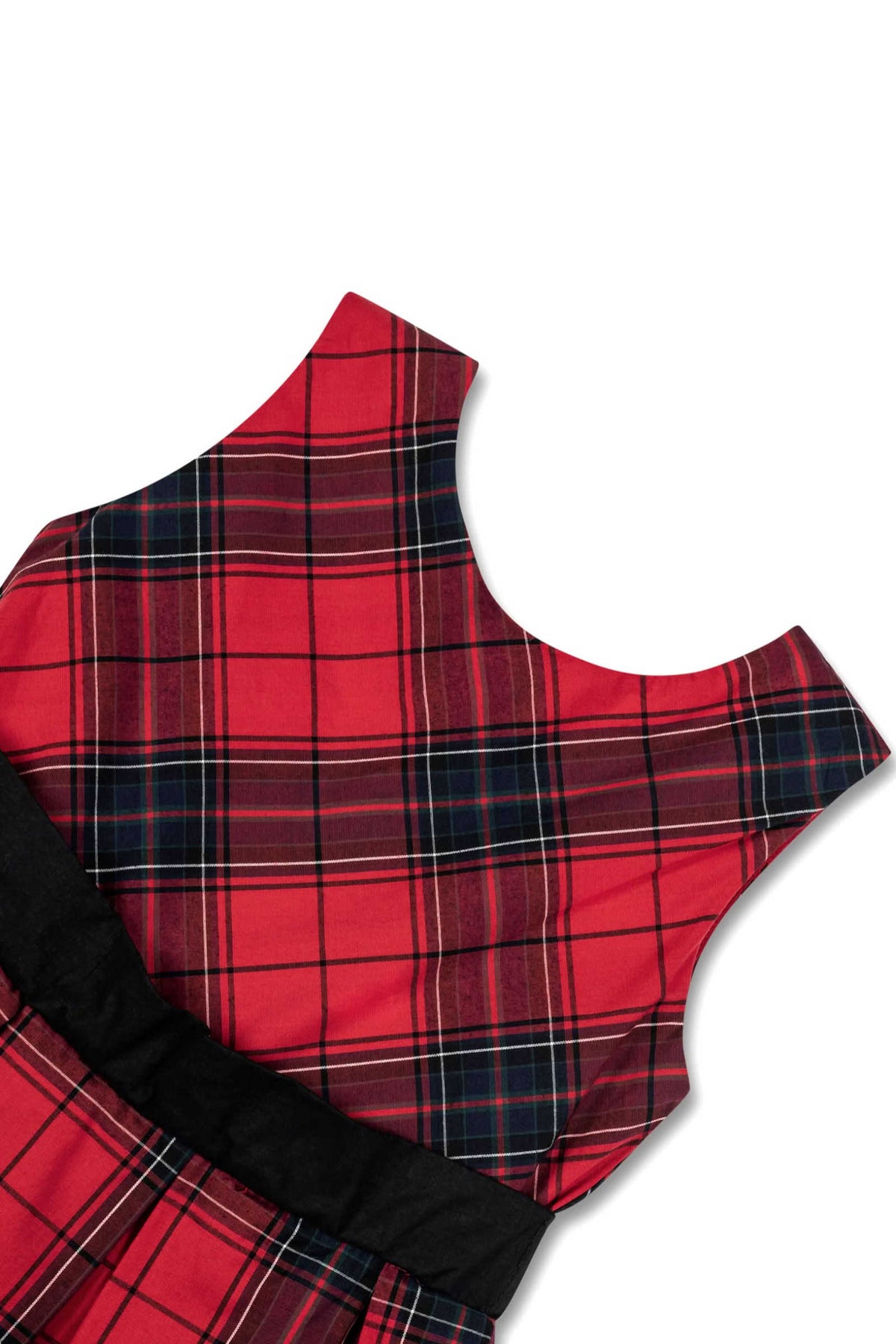 A close-up view of a red tartan dress featuring a fitted bodice with a scoop neckline and a pleated skirt.