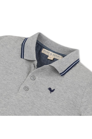 A close-up view of a dark gray heather polo shirt by Hope & Henry, featuring a flat-knit collar with navy stripes, front button placket.
