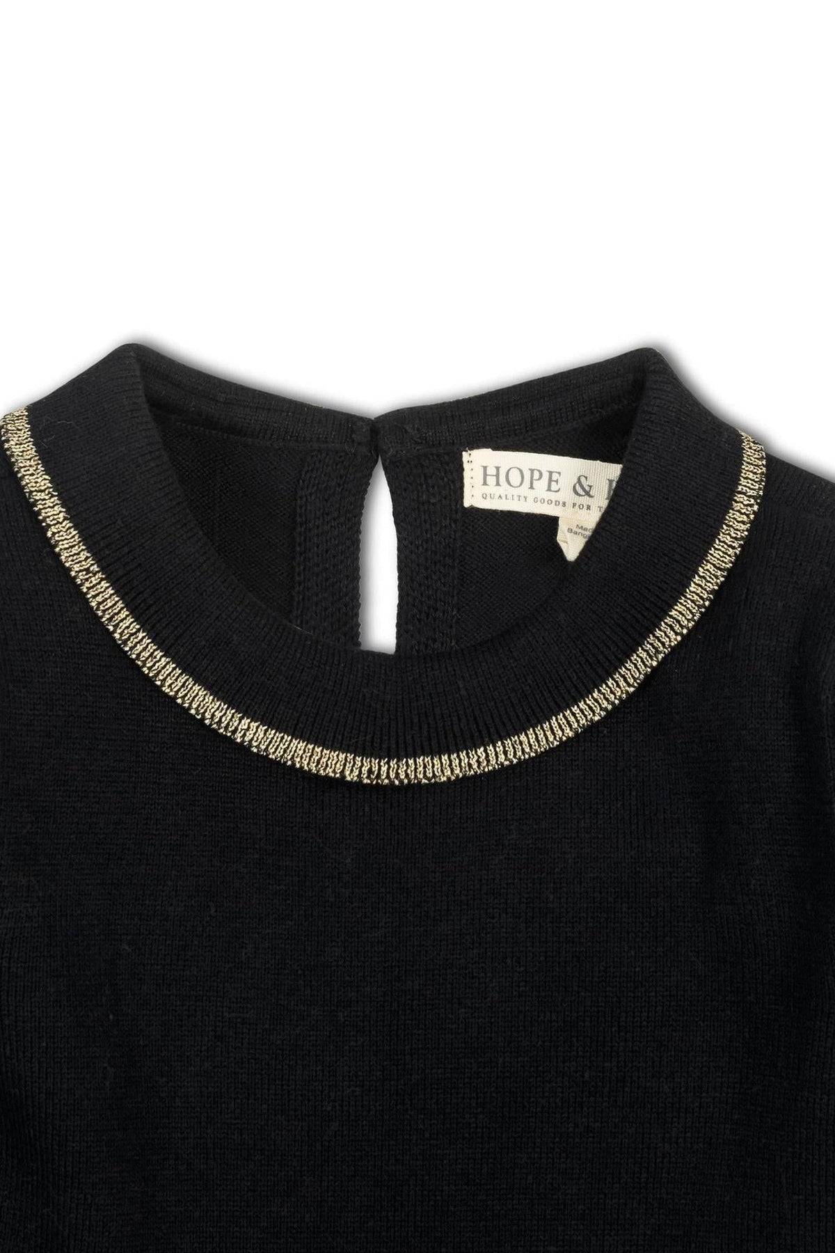 Close-up of a black sweater dress by Hope & Henry, featuring a gold-tipped collar and a back neck button closure. Made from soft organic cotton, perfect for toddlers and kids.
