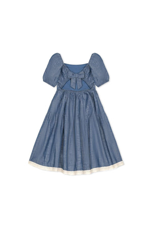 A chambray dress with bubble sleeves, featuring a tie-back bow and crochet trim along the hem, perfect for girls.