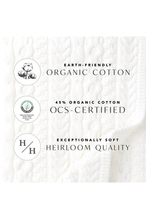 Close-up of a soft, textured white fabric made from 45% organic cotton, featuring eco-friendly attributes and OCS certification. The design emphasizes heirloom quality and sustainability for responsible consumer choices.