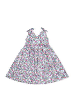 Floral linen swing dress featuring bow shoulder straps and a v-neck silhouette. The colorful pattern includes pink, purple, and green flowers, designed for toddlers and kids.