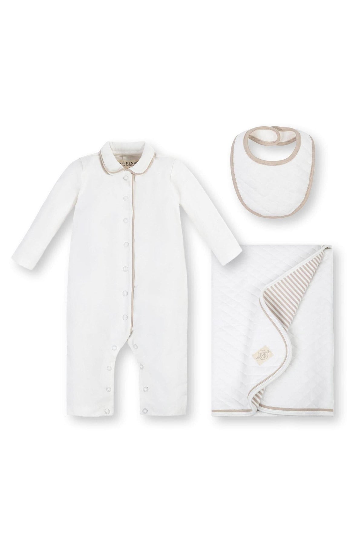 A three-piece baby gift set by Hope & Henry features a white organic cotton long-sleeve romper with a peter pan collar, a matching bib, and a quilted blanket in taupe.