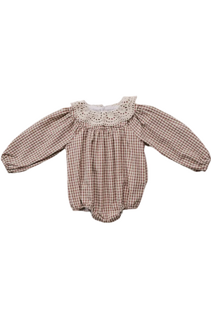 A baby girls bubble romper features a charming camel gingham pattern with a delicate lace collar. Made from soft, breathable cotton, it offers comfort for everyday wear and play.