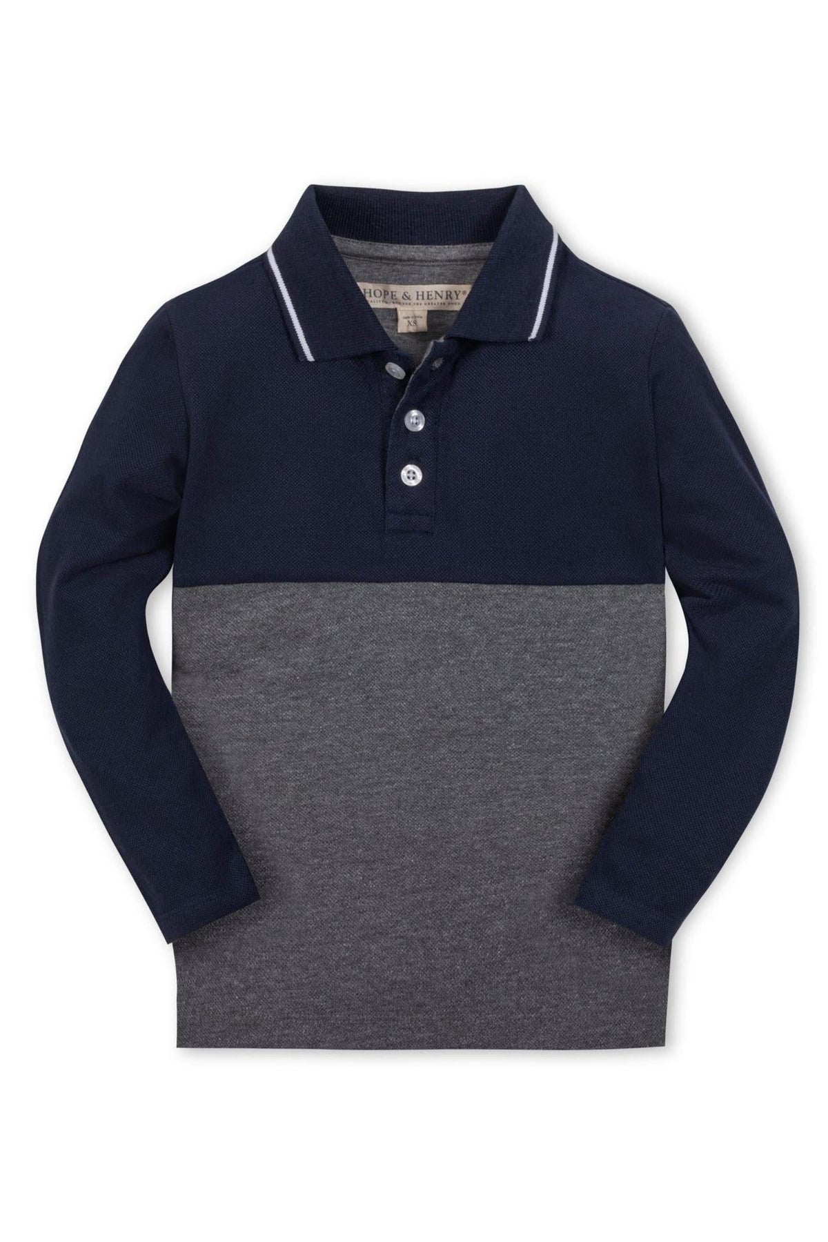 A long-sleeve colorblock polo for boys, featuring navy and gray organic cotton fabric. It includes a pointed collar with tipping and a front button placket for a classic look.