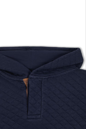 Navy quilted hooded sweatshirt with faux suede detail, designed for boys, featuring soft organic cotton fabric.