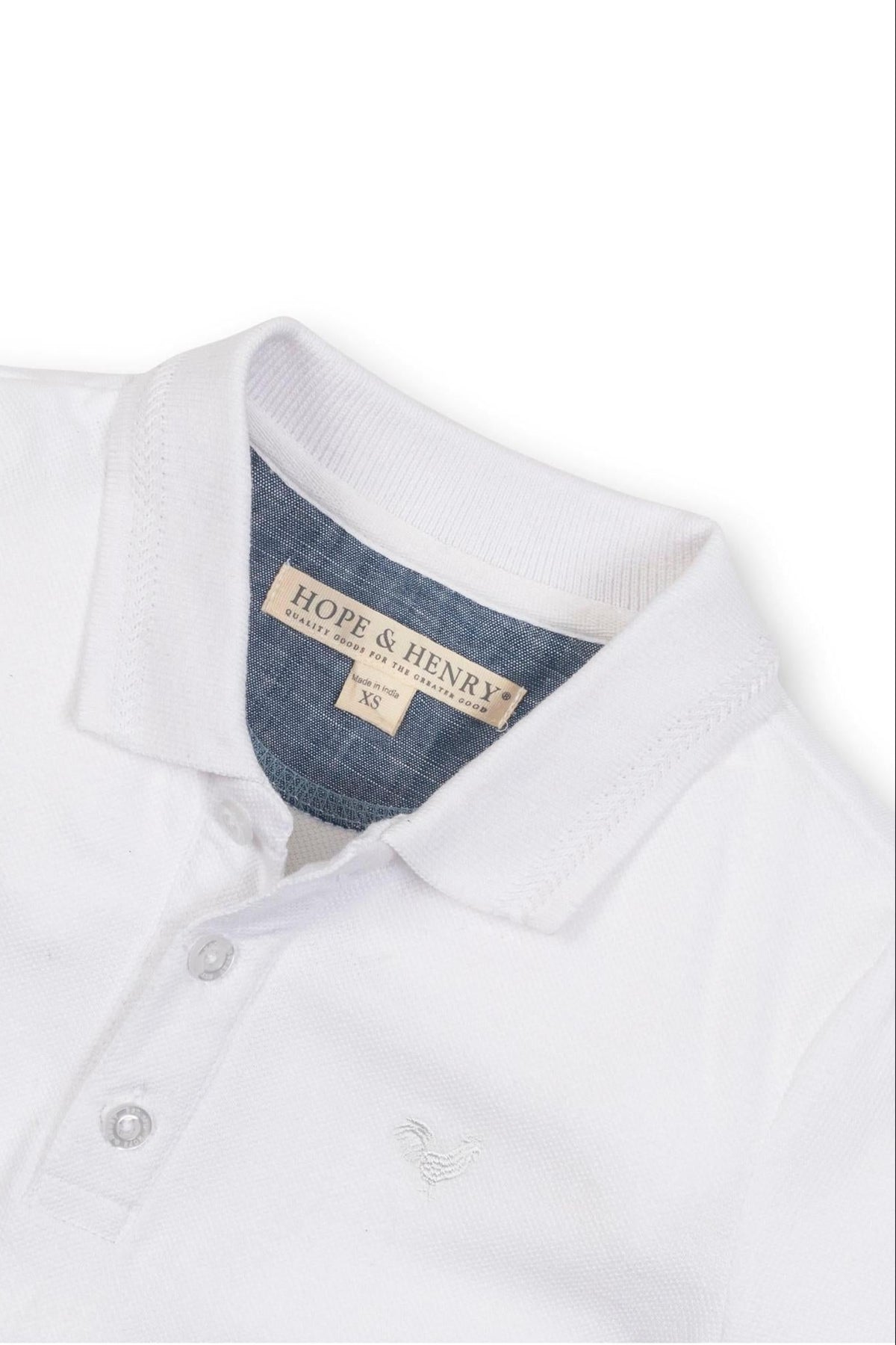 White organic cotton polo shirt from Hope & Henry featuring a flat-knit collar and a button placket.