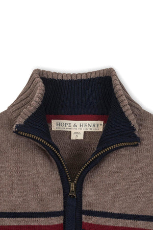 Close-up of a Hope & Henry organic cotton half zip sweater featuring a taupe heather base and navy ribbed mock.