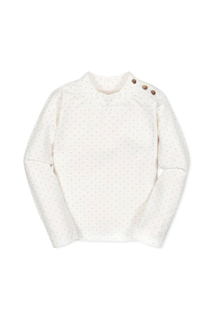 Soft white mock neck knit top featuring a dotted pattern and gold shoulder buttons. Made from organic cotton, this versatile piece is perfect for toddlers and kids.