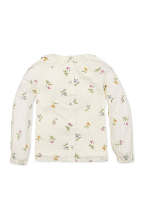 Ivory long-sleeve top featuring a ruffle collar and a delicate floral print in soft pinks, blues, and yellows.