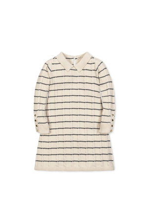 Ivory cable knit sweater dress featuring a Peter Pan collar and Breton stripes, with gold button cuffs.