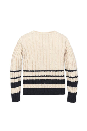 Back view of a cream cable-knit sweater with navy striped detailing, suitable for girls, made from organic cotton.