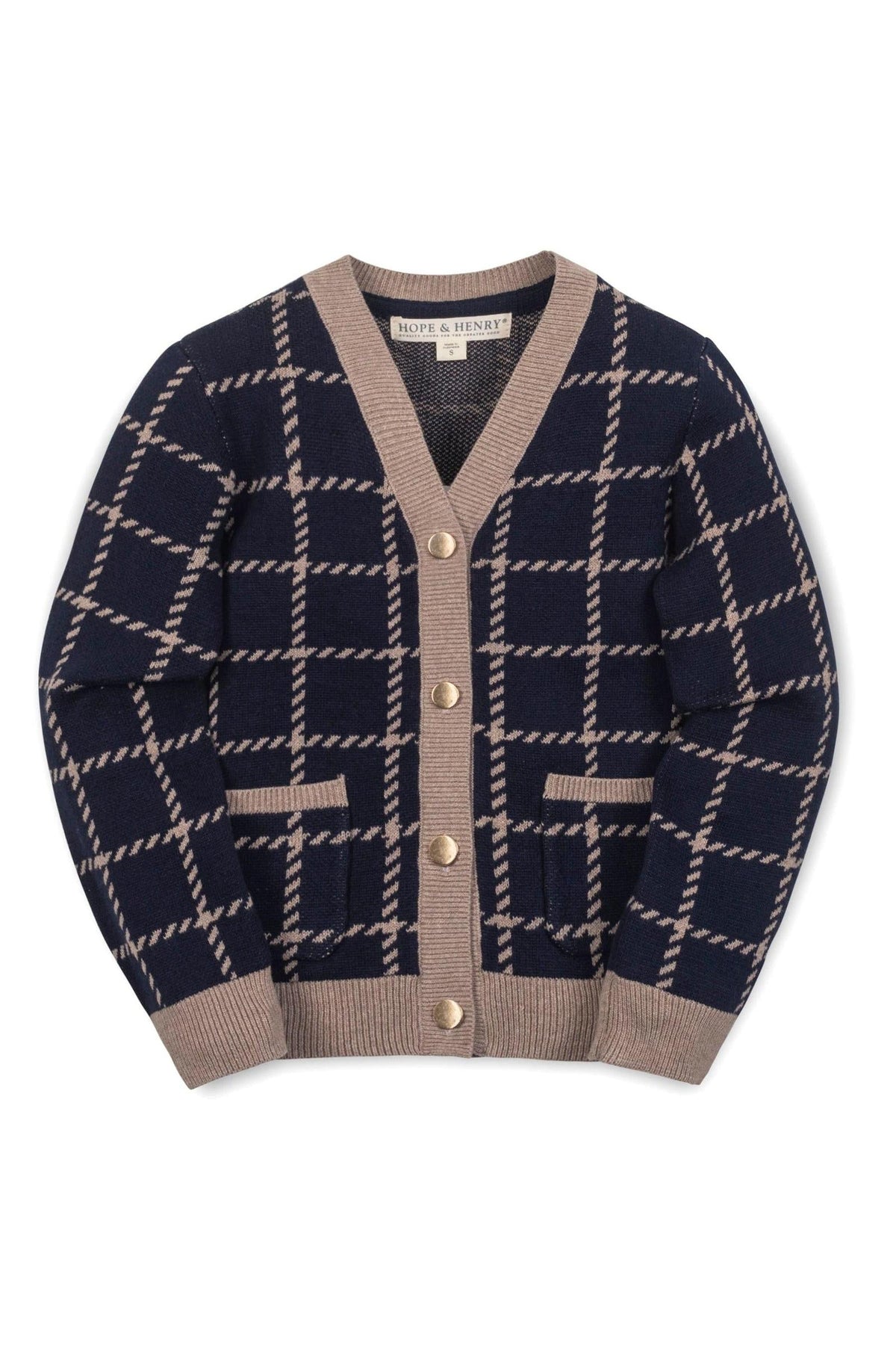 A navy and tan plaid cardigan for girls featuring a v-neck, gold button closure, and front patch pockets.