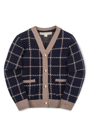 A navy and tan plaid cardigan for girls featuring a v-neck, gold button closure, and front patch pockets.