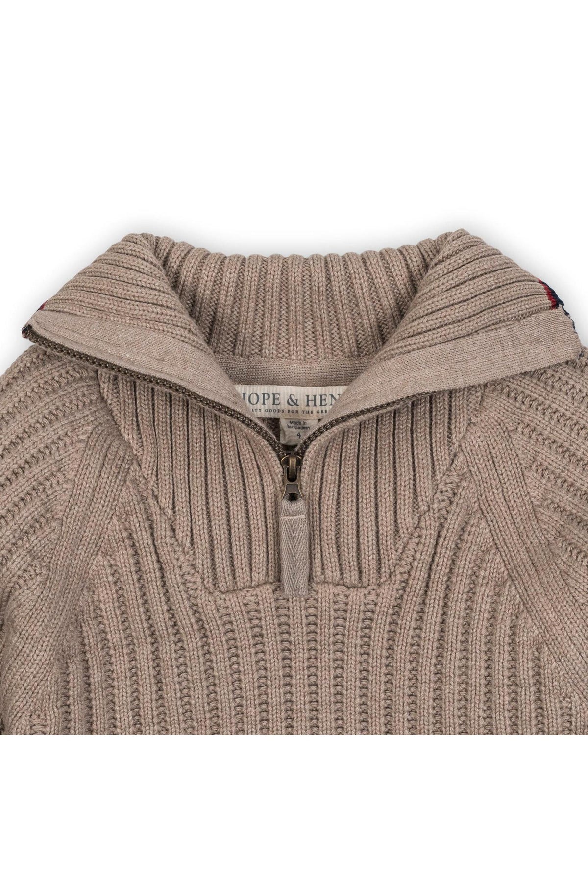 Close-up of a taupe heather rib knit half zip sweater dress by Hope & Henry, featuring a textured fabric and a stylish collar.