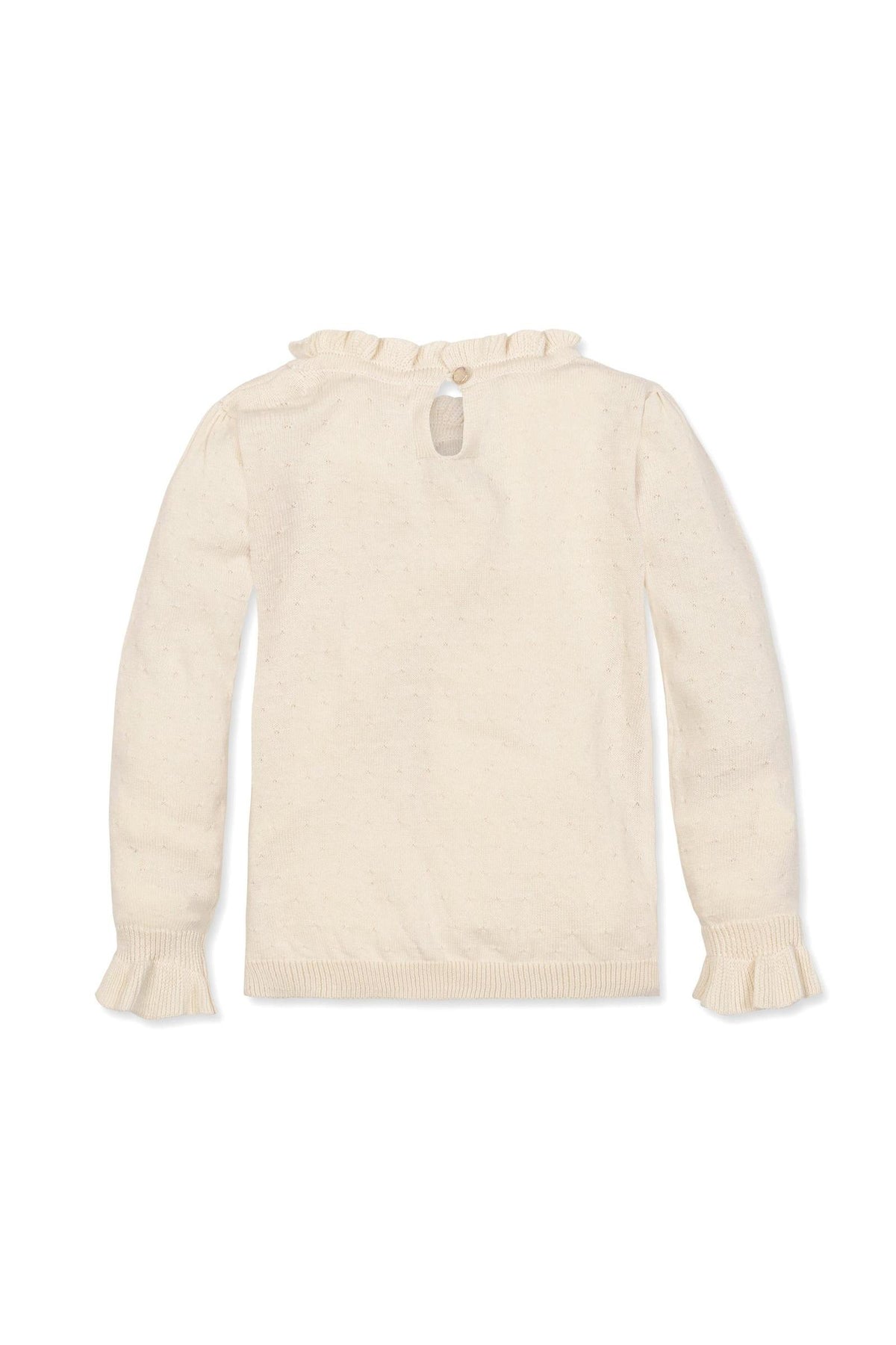 Back view of an ivory organic cotton sweater featuring ruffled edges and a keyhole closure with a button.
