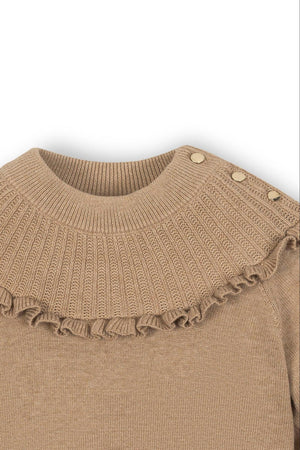 Close-up of a camel heather organic cotton mock neck sweater featuring a ruffle around the collar and decorative buttons on the shoulder, designed for toddlers and kids by Hope &.