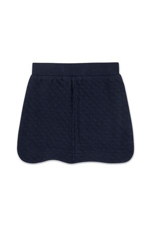 Navy blue quilted skort featuring an elastic waistband, designed for comfort and style for toddlers and kids.